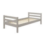 FLEXA single bed, CLASSIC range, grey finish, slatted base; child-safe edges; suited for a child’s room; white backdrop.