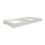 FLEXA WHITE drawers, pine with wheels, fit neatly under bed in child’s room; safe edges visible.