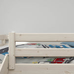 FLEXA White high bed with slide and ladder from CLASSIC collection, 90x200cm, child-safe rails in a kids’ bedroom.