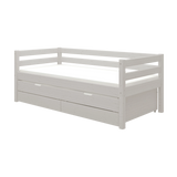FLEXA grey wooden single bed from CLASSIC collection with pull-out guest bed, safety rail, visible in a child’s bedroom.
