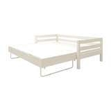 FLEXA single white wooden bed with pull-out guest bed, both extended; child-safe edges, suitable for kids’ bedroom.