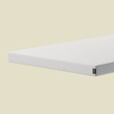 FLEXA DREAM white foam mattress, 200x120 cm, rectangular, on beige surface; visible as child-safe and hypoallergenic.